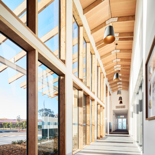 TLC Aged Care Homestead Estate sunlit hallway view with timber features and pendant lights - building photographer example / concept