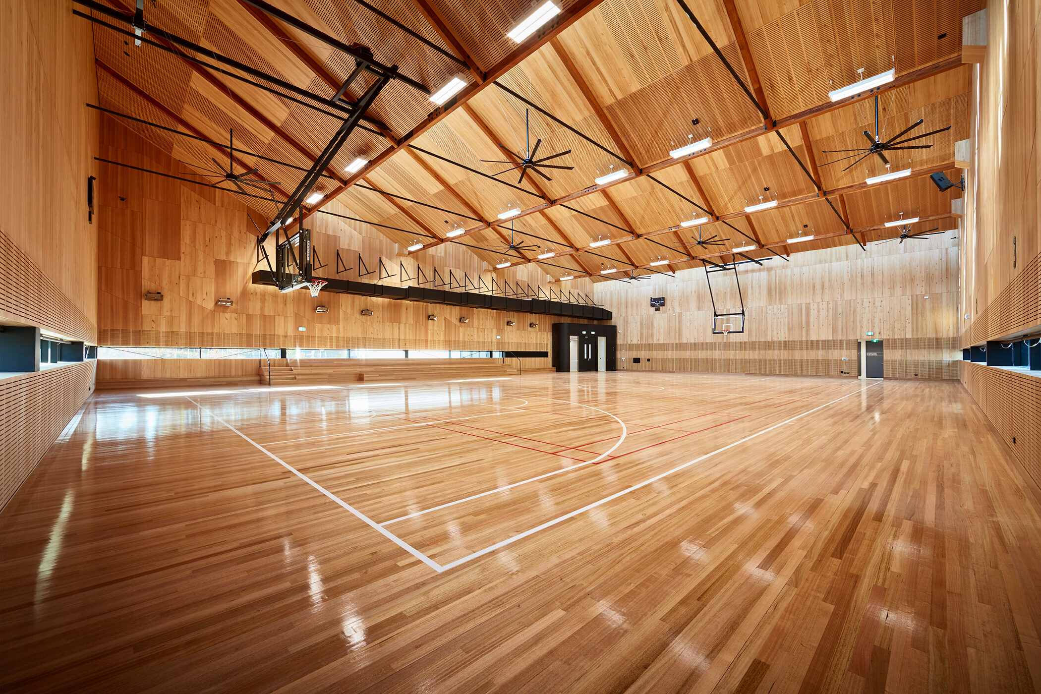Nunawading Community Hub basketball court with timber throughout - structure photographer example / concept
