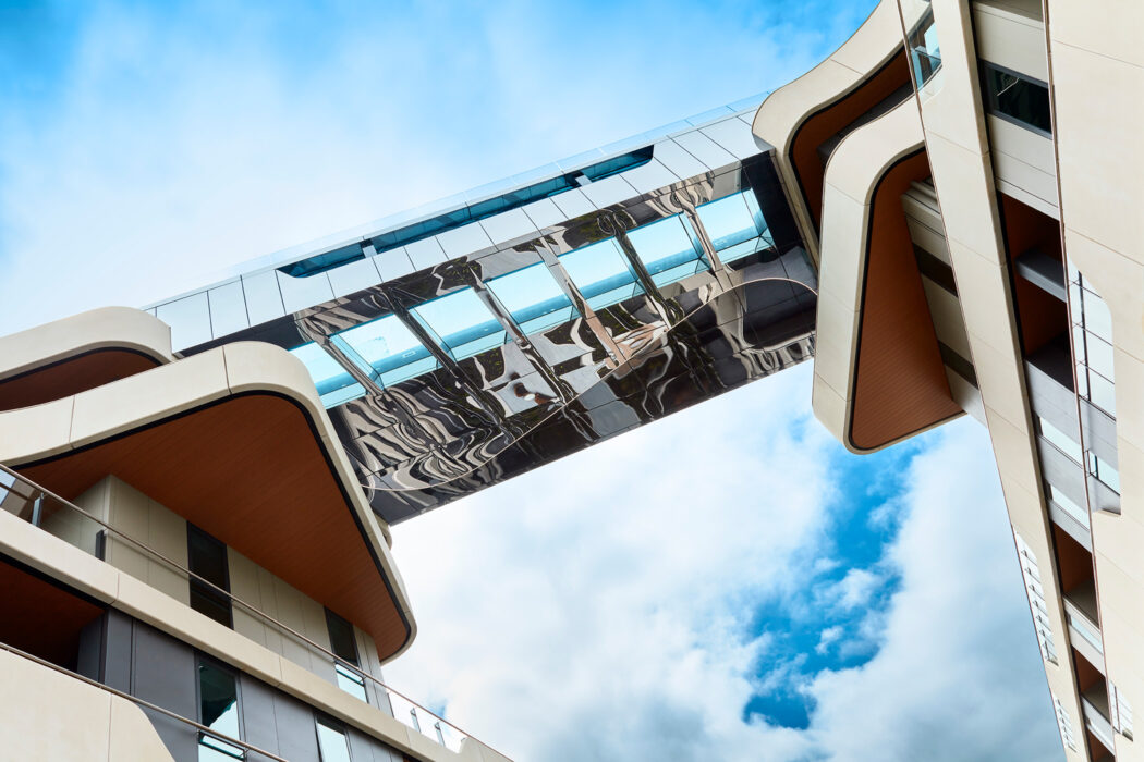 Hawthorn Park sky bridge linking two buildings with pool - building photographer example / concept