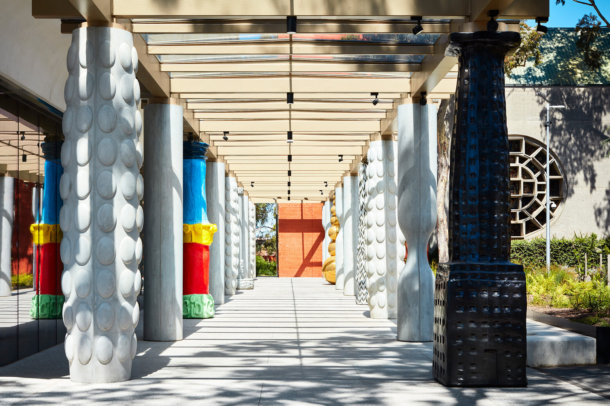 Monash University Chancellery artist walk or colonnade with shadow play - University example / concept
