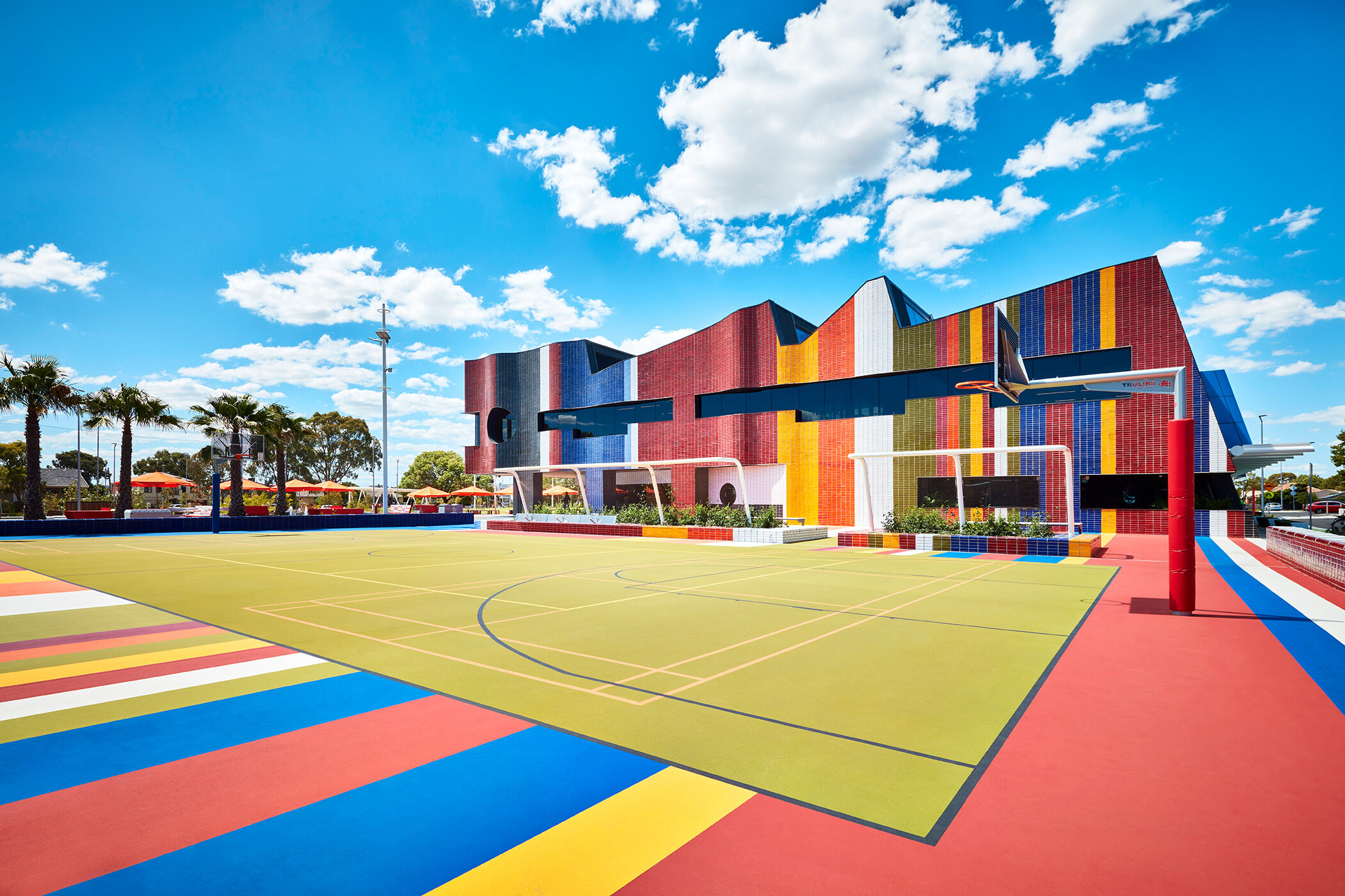 Springvale Library and Community Hubmulti coloured basketball court with tiled building - structure photographer example / concept