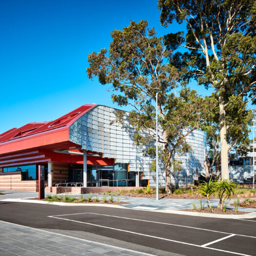 Springvale Library and Community Hub building curving around tree - structure photographer example / concept