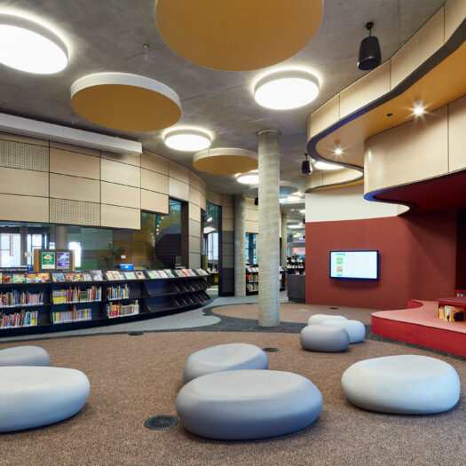 Springvale Library and Community Hub children's area with pebble seats and round ceiling lights - structure photographer example / concept